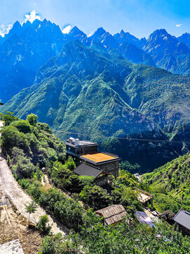 Remote village among steep mountain peaks