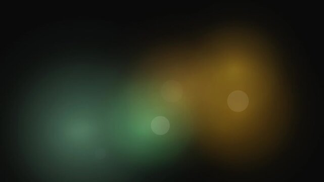 An abstract composition featuring soft bokeh light orbs in green and yellow tones against a dark background.