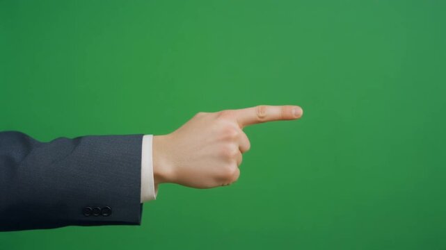 Professional corporate hand pointing right against a solid green screen for business presentations, UI website design, and motion graphics overlay.