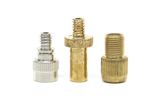 Set of three bicycle valve adapters for inflating tires with different pump types