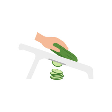 Hand slicing cucumber on mandoline slicer for fresh salad preparation