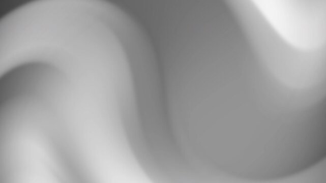 A smooth and elegant abstract gradient background featuring blurred gray and white waves moving in a slow, fluid motion.