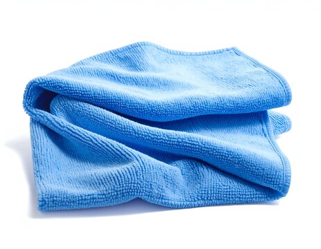 Blue Microfiber Cleaning Cloth Folded Isolated on a White Background