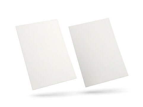 Two blank vertical paper sheets floating in the air