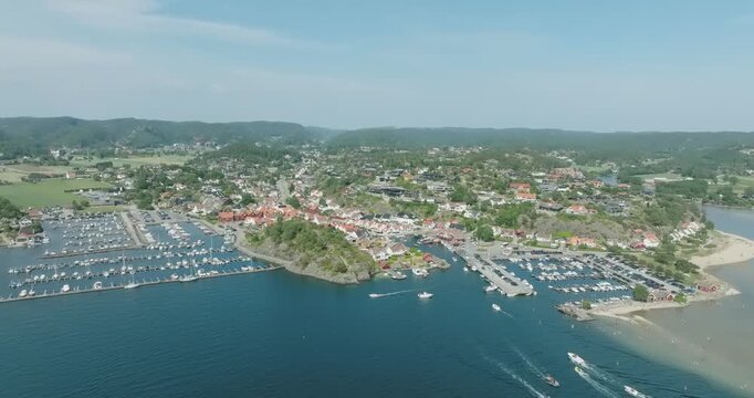 Aerial view of coastal marina and residential area in H&oslash;llen Norway