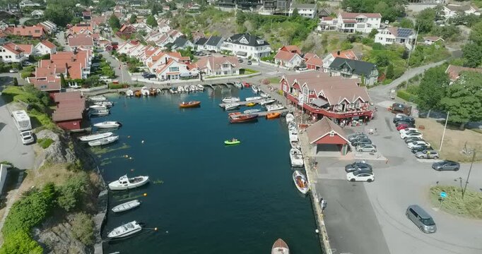 Aerial view of coastal marina and residential area in H&oslash;llen Norway