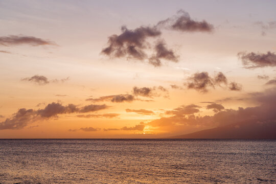 Calm ocean at sunset in Hawaii