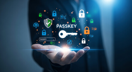 Fototapeta premium Businessman holding a digital interface showing passkey authentication and cyber security symbols.