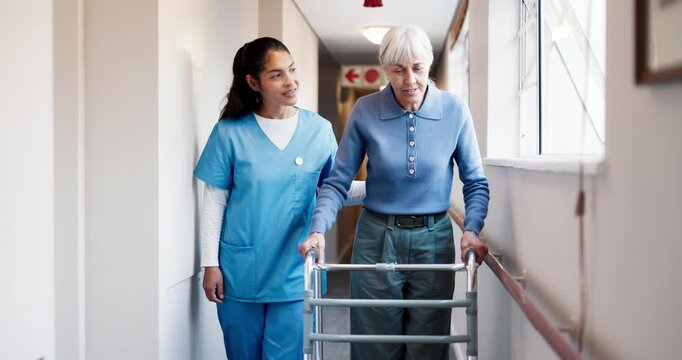 Nurse, old woman and help with walker in hallway for mobility, balance and support in retirement. Patient, caregiver and elderly person with disability, frame or rehabilitation for healing in house