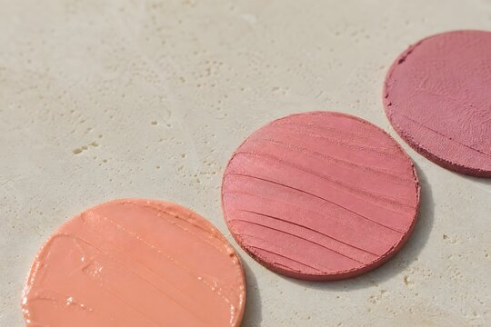 Cosmetic Cream Swatches on Textured Surface with Copy Space