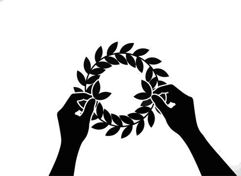 Hands crafting a paper wreath decoration. DIY craft and creativity concept