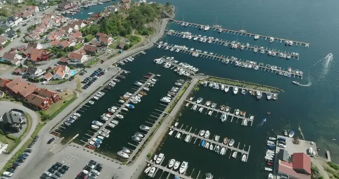Aerial view of coastal marina and residential area in H&oslash;llen Norway