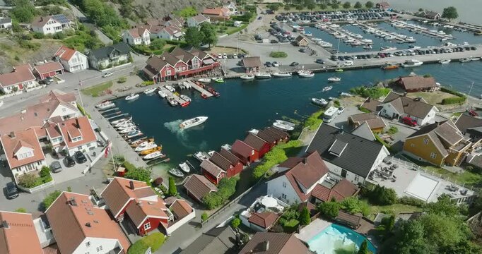 Aerial view of coastal marina and residential area in H&oslash;llen Norway