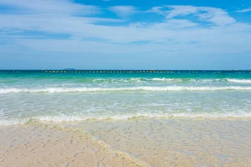 White sand beach wave sea background blue sky with fuffy cloud © themorningglory