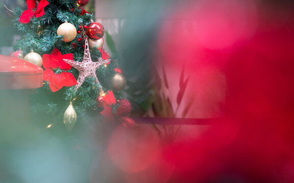 Christmas tree decorated with ornaments, soft focus. Holiday concept.