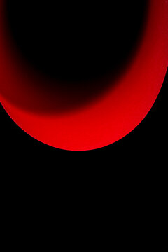 Abstract background of colored paper sheets on a black background