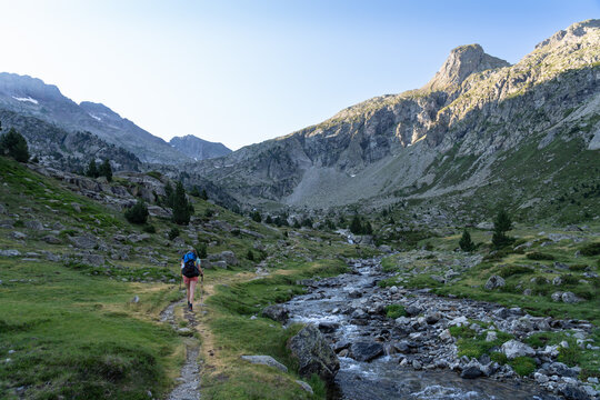 Female hiker on the famous Haute Randonn&eacute;e Pyr&eacute;n&eacute;enne trail in France.