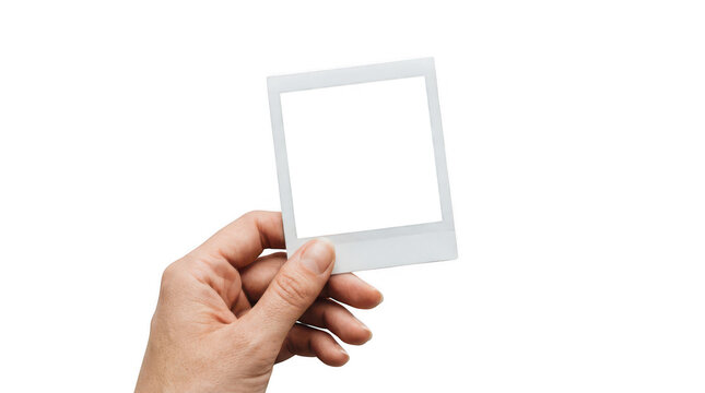 Blank instant photo frame held by human hand, empty vintage picture mockup for photography presentation, retro photo print border template isolated on Transparent Background