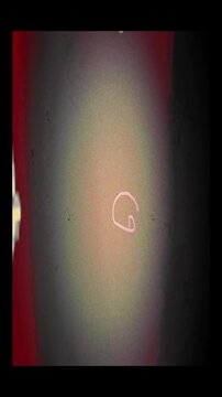 Nostalgic 8mm Blinking Frame with Vintage Light Leaks. Real vintage 8mm film blinking frame featuring authentic light leaks and grain for nostalgic cinematic storytelling overlays 4k video