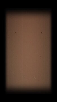 Nostalgic Cinema Effect, Vintage 8mm Film Overlay with Warm Sepia Noise. Vintage 8mm Film Blinking Frame Overlay for Nostalgic Retro Cinematic Productions 4k video