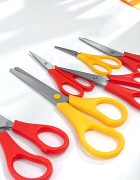 Scissors in red and yellow color.
