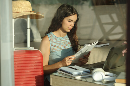 Student studying on vacation memorizing notes