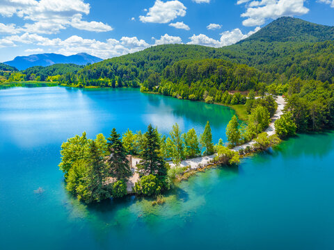 Aerial view of Lake Doxa with Agios (saint) Fanourios chapel in Peloponnese, Greece
