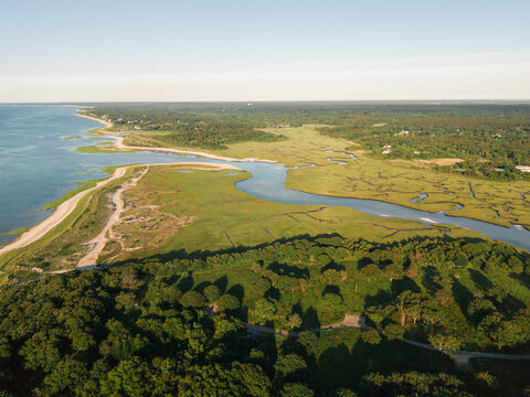Aerial view of a coastline salt marsh and beach