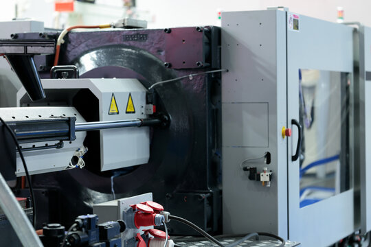 plastic injection molding machine IMM close up