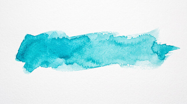 Teal watercolor brush stroke isolated on white textured paper background.
