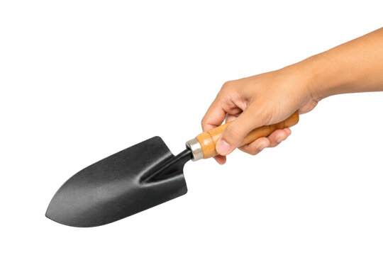Hand holding a soil tilling shovel isolated on a white background, showcasing a practical gardening hand tool for digging, cultivating, planting, landscaping, and home garden maintenance.
