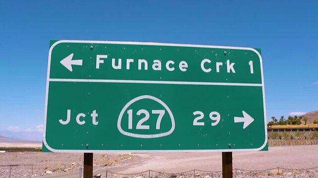 Furnace creek road signs in Death Valley