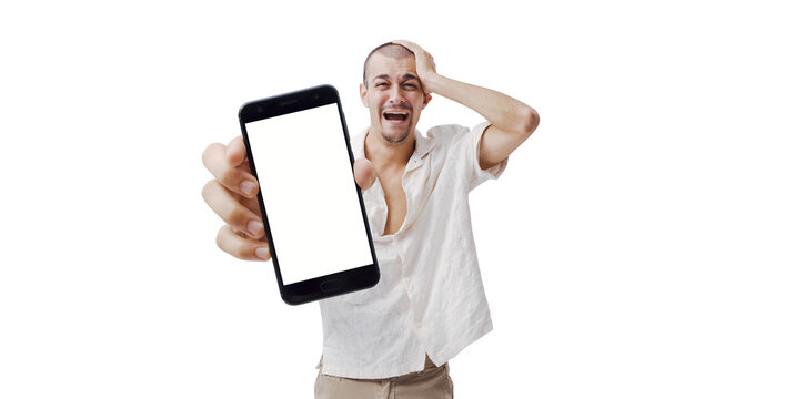 Frustrated Young Man Showing Smartphone with Blank White Screen Mockup
