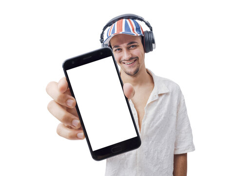 Smiling Young Man with Headphones Showing Smartphone Blank Screen Mockup on Blue Background