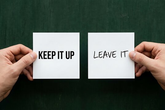 Hands hold notes with 'Keep it up' and 'Leave it'. Motivation and decision concept.