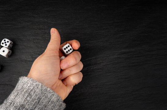 White game dice with black dots