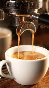 The Art of Brewing: A Coffee Machine Extracting Rich Espresso into a White Cup, Capturing the Essence of Coffee Making with Creamy Swirls
