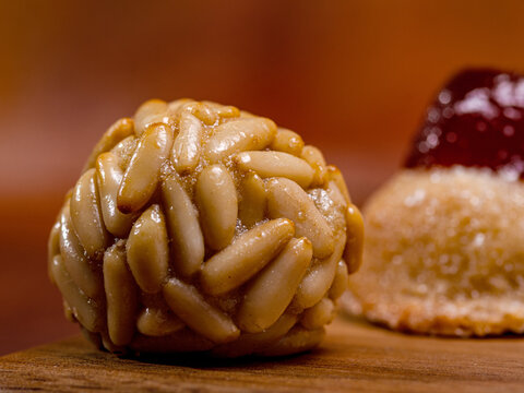 Panellets covered with pine nuts, typical dessert during castanyada in catalonia