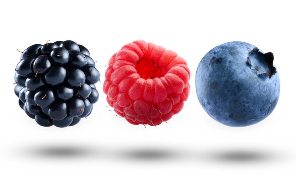 Mix berries levitate on white background