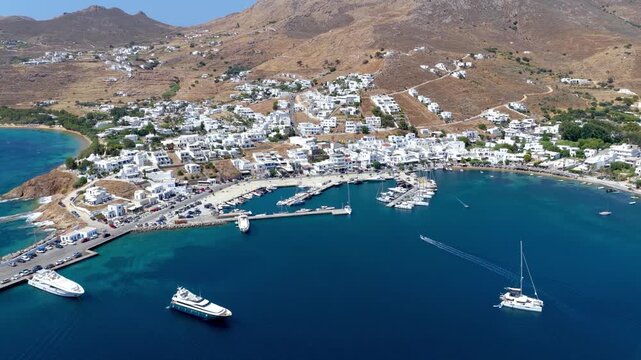 Aerial view of the town and port of Livadi at Serifos island, Cyclades, Greece, during a sunny summer day