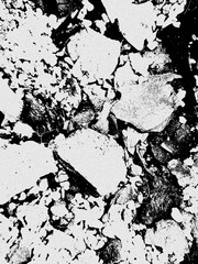 Fototapeta premium an abstract black and white grunge distress texture with rough, weathered, and grainy surface patterns.