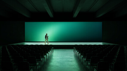 Naklejka premium Distant female keynote speaker framed by green screen in dark conference venue. Concept of startup pitching, event marketing, future learning.