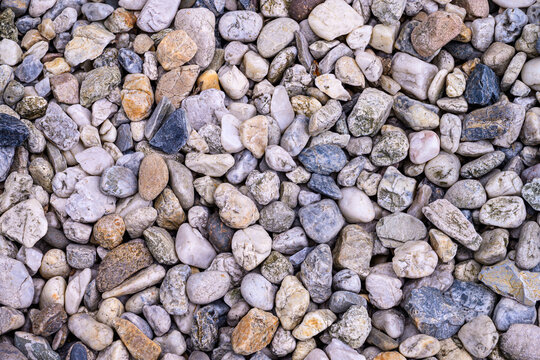 Texture of gravel stones on ground