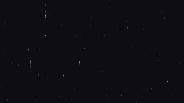 Darkness with faint glowing particles in a cinematic sweeping motion during a slow reveal