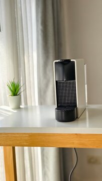 Capsule coffee machine in kitchen