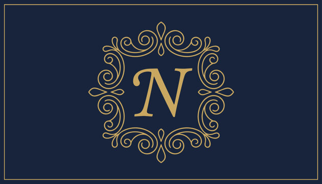 Luxurious gold letter N monogram emblem inside a classical ornate scrollwork frame on deep navy blue.
