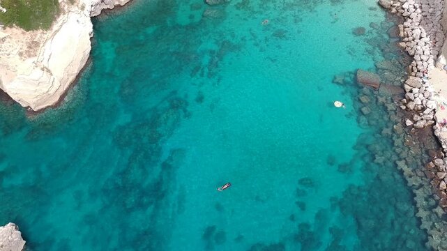 Italy, Puglia, Top Down Aerial View of Turquoise Adriatic Sea, Ocean, Rocky Coast, Beach