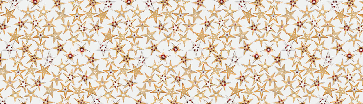 Cookies background, seamless pattern. Star shape gingerbread cookies, decorated, frosted, berries on top, various designs. Isolated on white, duplicated. Food banner, Christmas decorations, sweet food
