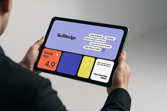 Person using tablet with colorful online learning app interface