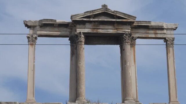Detail of the marble arch and Corinthian columns of the Arch of Hadrian in Athens Greece